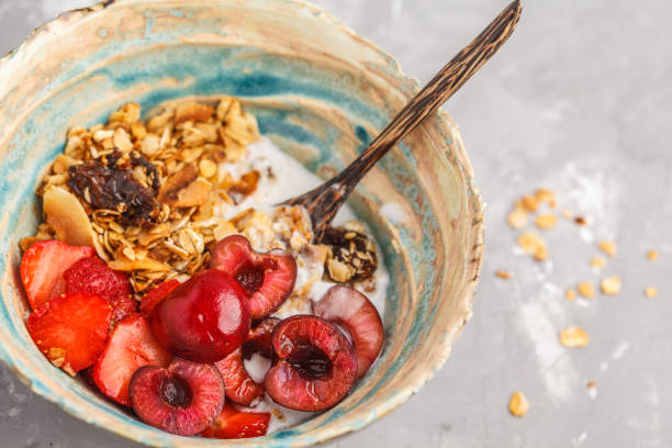 Homemade granola with yogurt and berries. Healthy food concept.