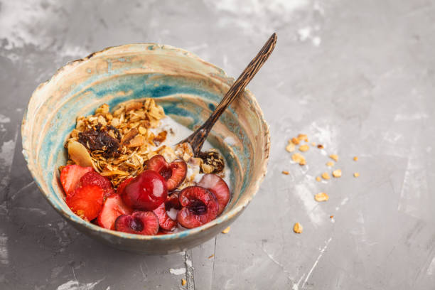 Homemade granola with yogurt and berries. Healthy food concept.
