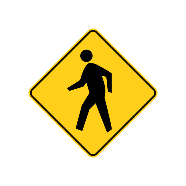 istock USA traffic road signs. pedestrian crossing ahead. vector illustration 990609528