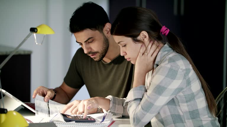 Man and Woman Worried For Taxes And Family Budget