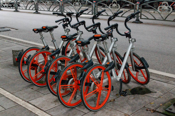 istock Bicycles on a rack, available for rent 990635660