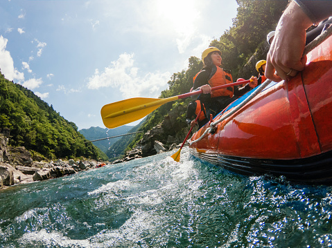 Low angle view of a white water river rafting excursion