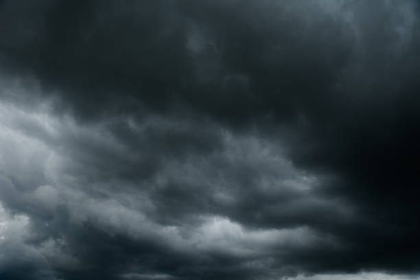 istock Dark clouds and thunderstorm with rainy, Dramatic  black clouds in summer 990656674