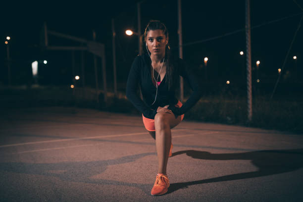 istock Fit girl training at night 990659550