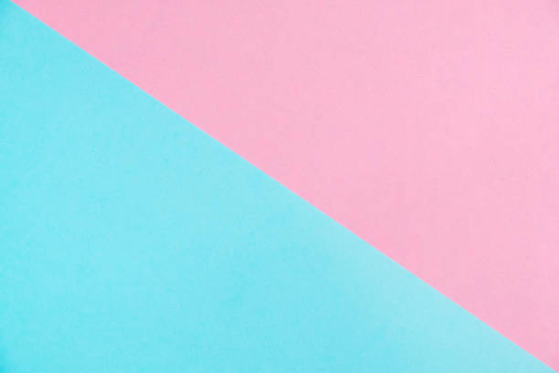 istock Pastel colored paper flat lay top view, background texture, pink and blue. 990660156