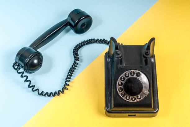 istock Vintage telephone on a colorful background 990660646