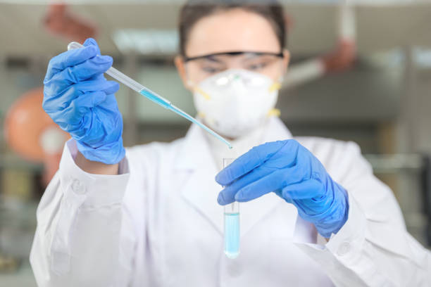 istock Young female scientist working in the laboratory 990690338