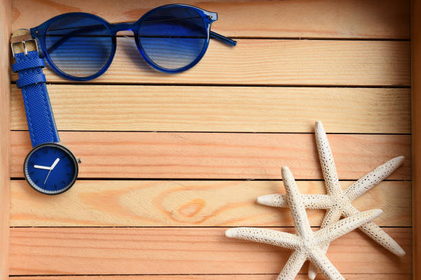 istock Summer hat and sunglasses with accessories and sandals 990697544