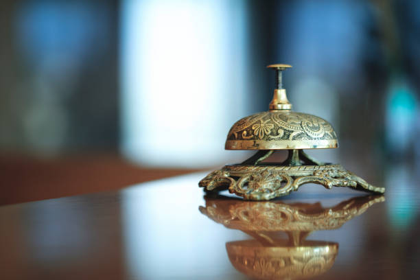 concierge bell over defocused background - hotel concierge service service bell imagens e fotografias de stock