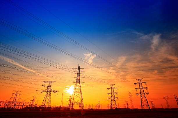 istock Electric tower, silhouette at sunset 990719014