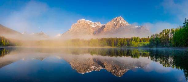 istock Panoramic Foggy Morning Wedge Pond with Mt. Kidd, Alberta Kananaskis 990738678