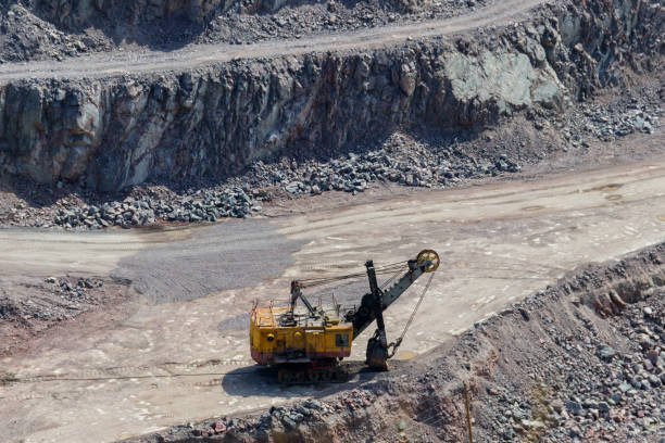 istock Extraction of mineral resources in the granite quarry 990741096