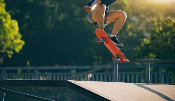istock skateboarder skateboarding on skatepark 990746192