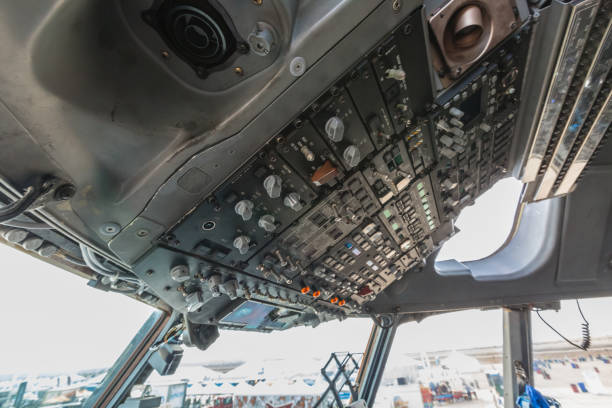 istock Interior of Boeing C-17 Globemaster III plane fuselage with seats and ground attachment points 990754956