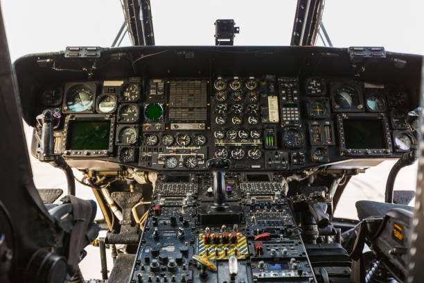 Interior of Boeing C-17 Globemaster III plane fuselage with seats and ground attachment points
