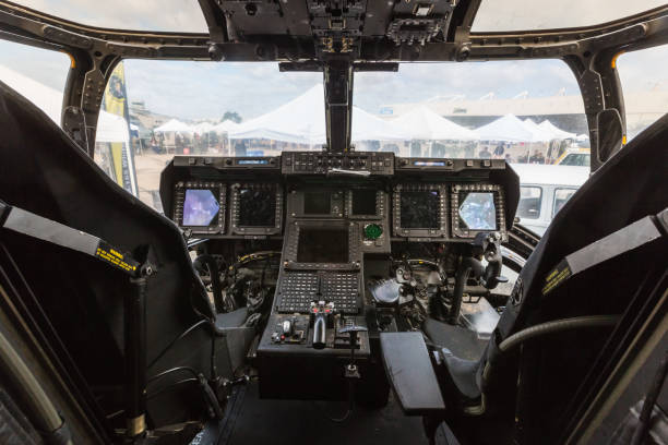 Interior of Boeing C-17 Globemaster III plane fuselage with seats and ground attachment points