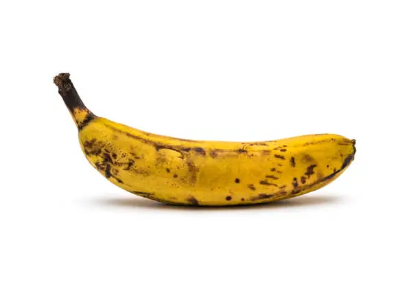 Photo of Overripe banana on white background