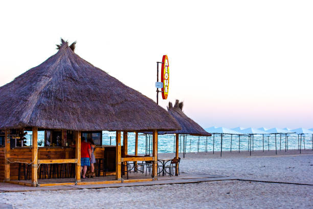 A bar on the beach and a beautiful sunset