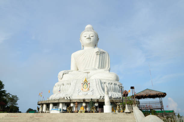 istock White large concrete Buddha statuette in Phuket 990808384
