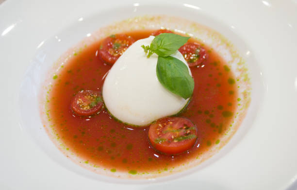 istock Version of Caprese salad with cherry tomatos 990833504