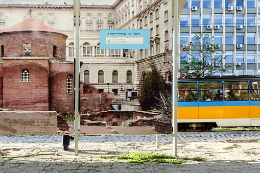 Sofia, Bulgaria July 2, 2018  Refection of the old and the new in Sofia at a bus stop