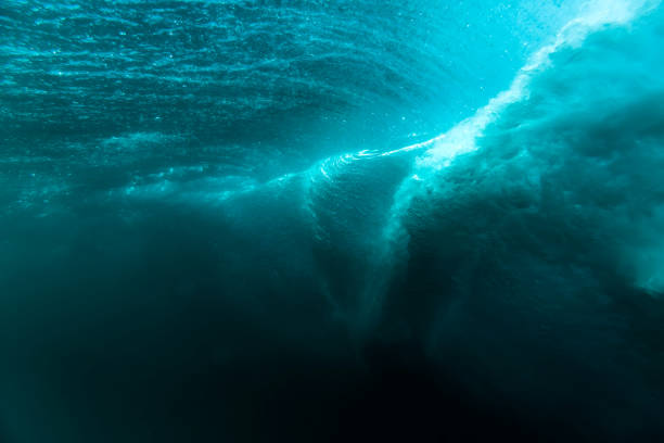 istock Barrel wave is underwater. Blue ocean in underwater 990844950