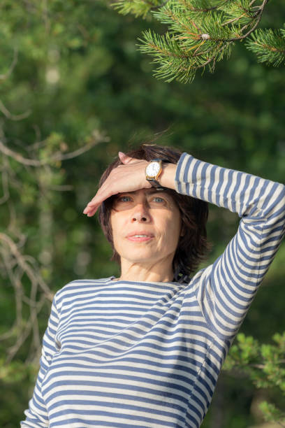 istock woman in a forest 990853354