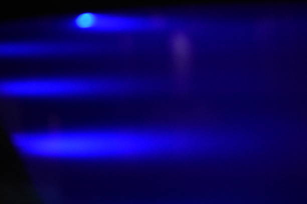 istock Reflections of lights on a pool at night 990860212