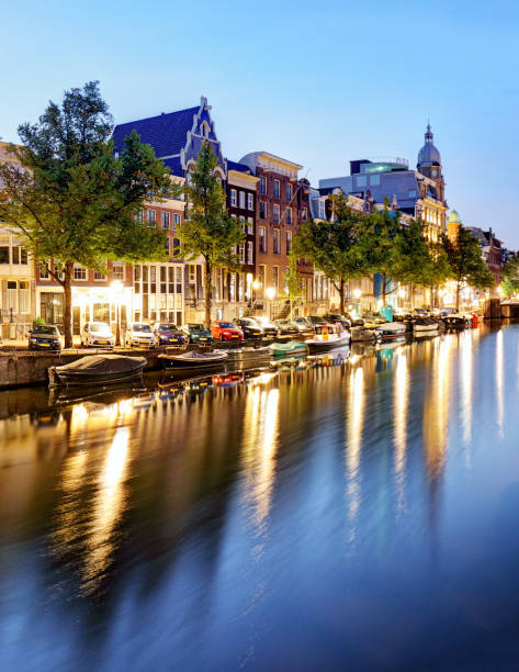 istock Amsterdam Canals West side at dusk Natherlands 990864240