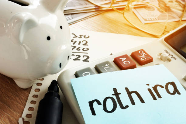 istock Roth ira written on a memo stick. 990864284