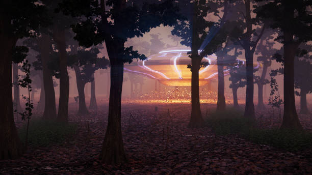 istock UFO landing in the forest at night, science fiction scene with alien spaceship (3d space illustration) 990865546