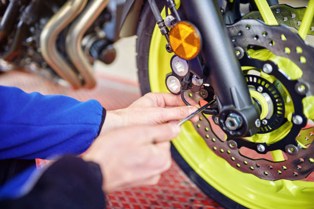 istock Motorbike repair shop 990880954