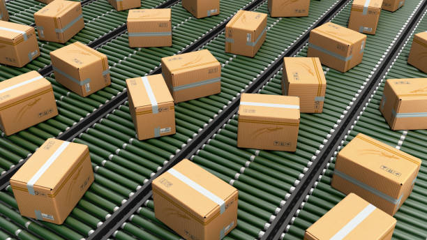 istock Modern Packages delivery packaging service and parcels transportation system concept cardboard boxes on conveyor 3d render 990881106