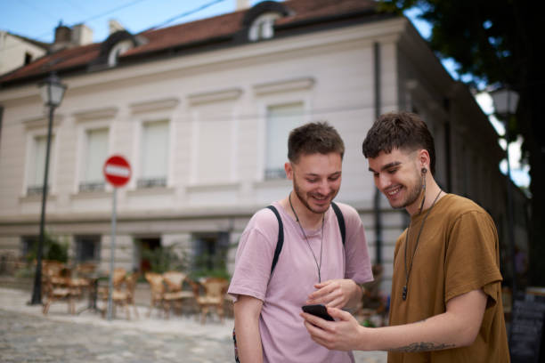 istock Gay couple outdoors 990888332