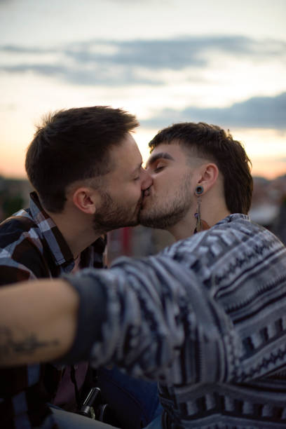 gay couple outdoors - homosexual beautiful sensuality love imagens e fotografias de stock