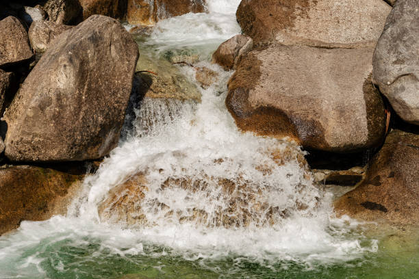 istock Water Flowing in a Creek - Chiese River Italy 990889462