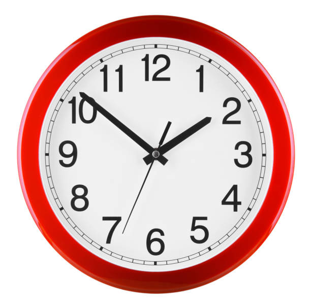 istock Wall clock isolated on white background. Ten to two 990889654
