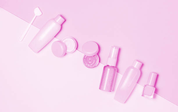 istock Pink decorative cosmetic on pink background. 990893782