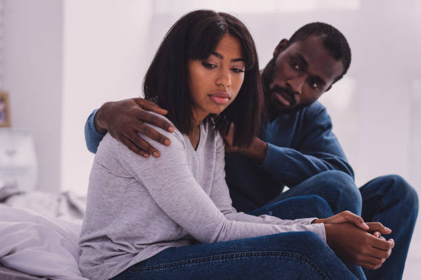 istock Upset female person being deep in thoughts 990897414