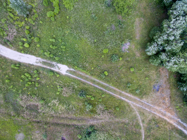 istock country road, view from above 990947838