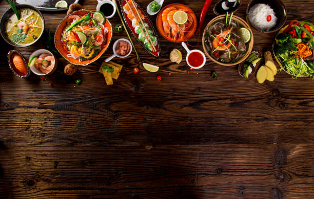 istock Various of asian meals on rustic background , top view , place for text 990973602