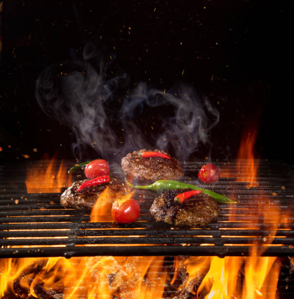 istock Beef steaks on the grill with flames 990984470