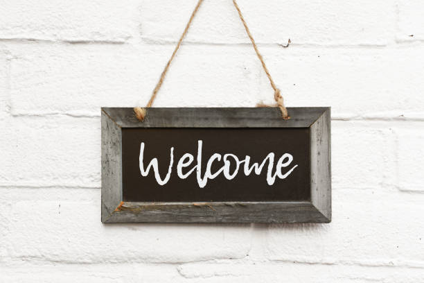 istock Chalkboard sign board with text welcome come in 990986208