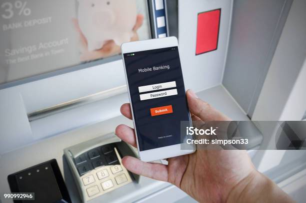 Person Holding A Phone With A Login Screen For Mobile Banking Stock Photo - Download Image Now