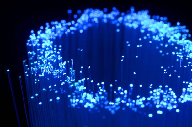 istock Fiber optics in blue, close up with bokeh 990993550