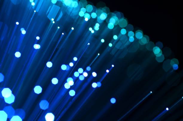 istock Fiber optics in blue, close up with bokeh 990993558