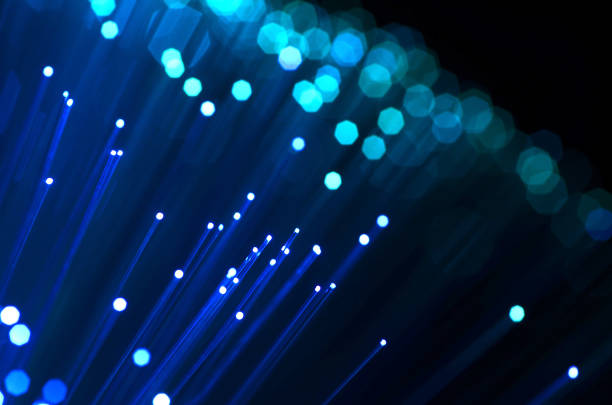 istock Fiber optics in blue, close up with bokeh 990993570
