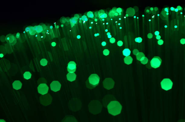 istock Green Fiber optics, close up with bokeh 990995724