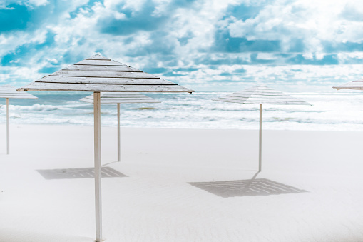 Wooden beach umbrellas