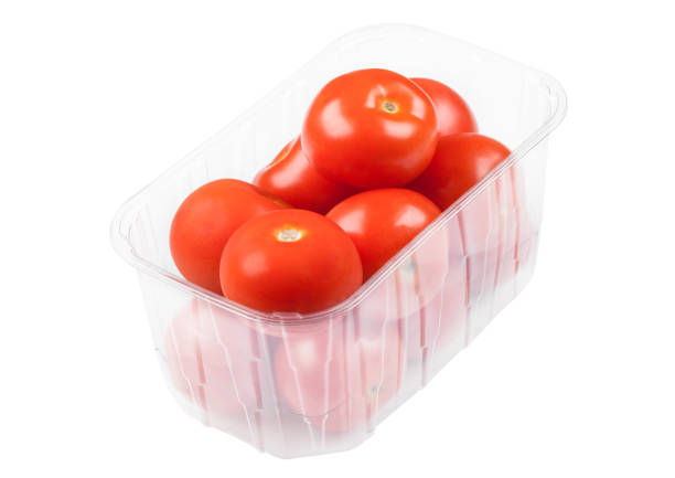 istock Plastic tray with fresh organic raw tomatoes 991005624